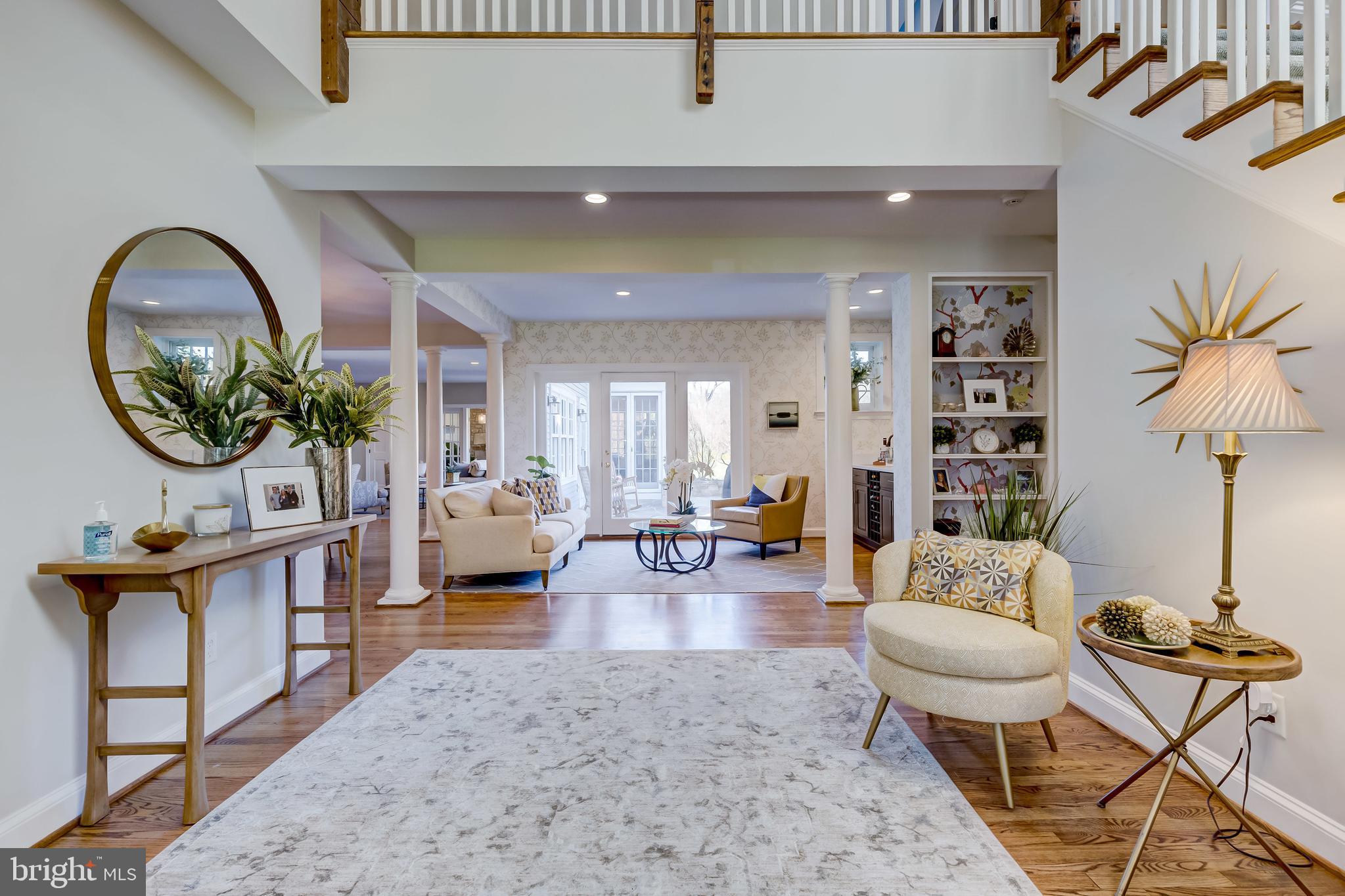 Foyer - double story and access to the back patio