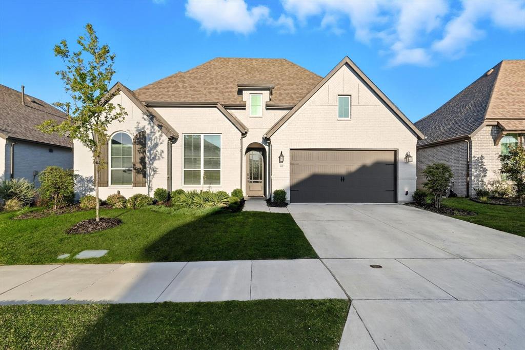 4608 Mount Vista Road Oak Point, TX 75068 - Photo 39 of 39 Contemporary single-story home featuring a light brick exterior and dark trim accents