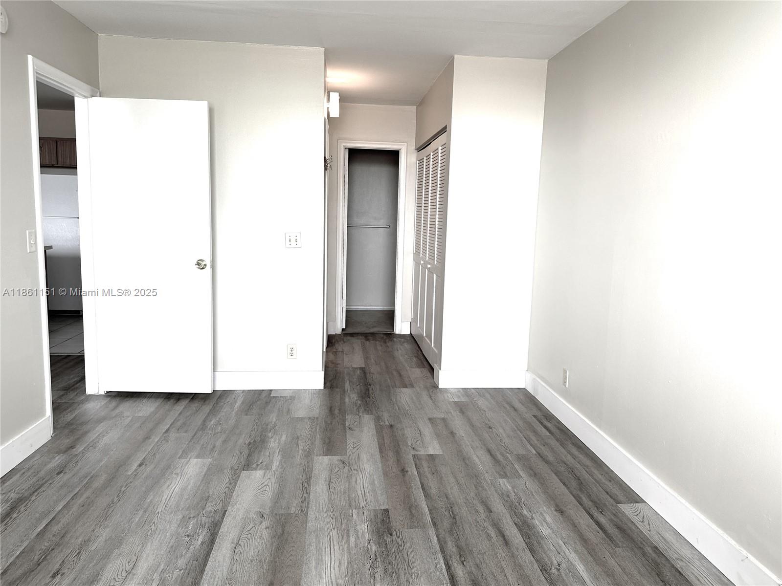 2501 Riverside Drive, Unit 506A Coral Springs, FL 33065 - Photo 10 of 15 a view of a room with wooden floor