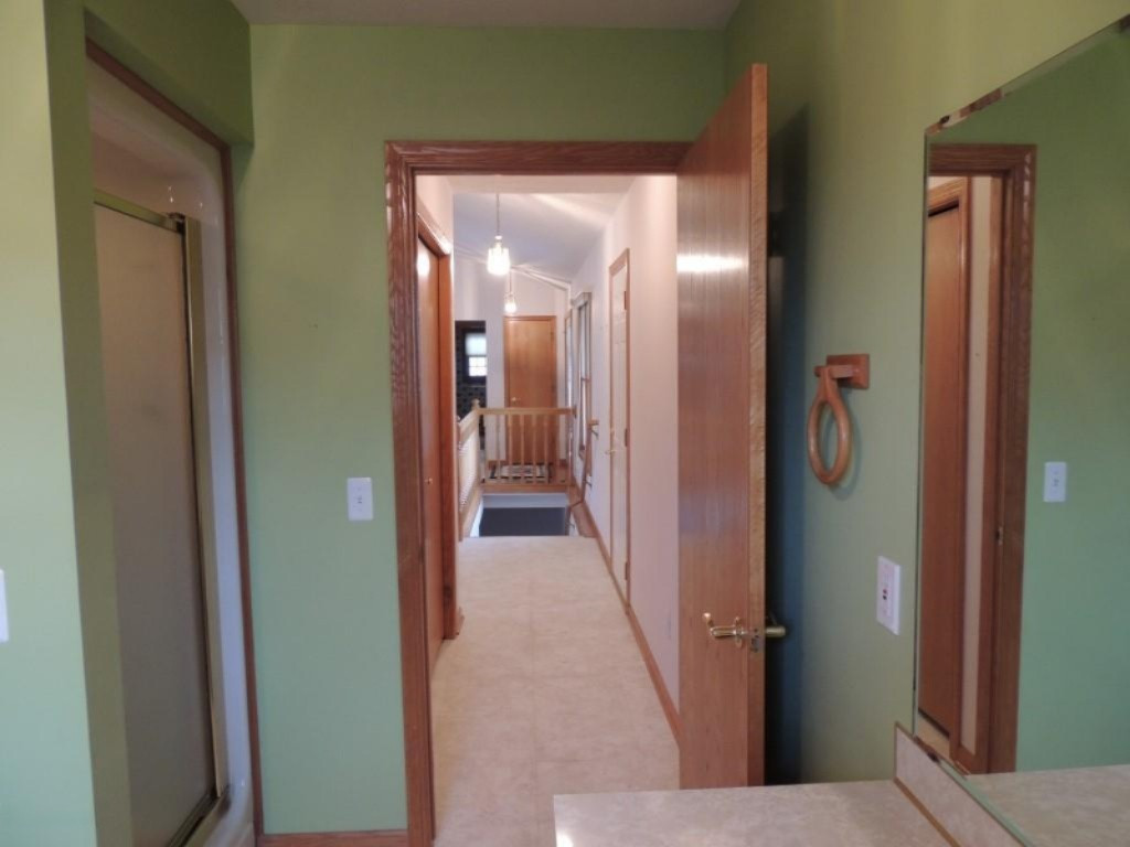 7644 Golfview Court Jenison, MI 49428 - Photo 21 of 45 Laundry view to front door area