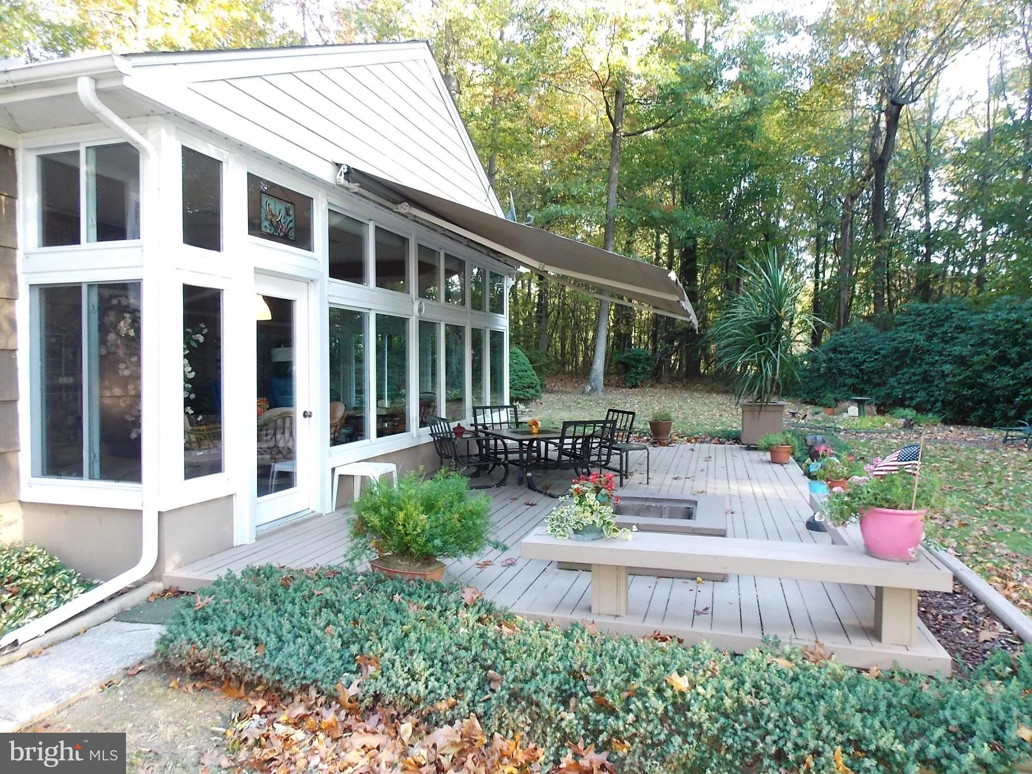 916 Greenfield Road Joppa, MD 21085 - Photo 4 of 30 Sunroom with Retractable Awning