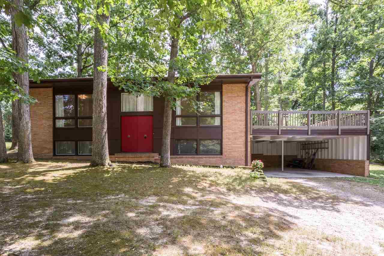 3900 Donna Road Raleigh, NC 27604 - Photo 1 of 25 a house with trees in front of it