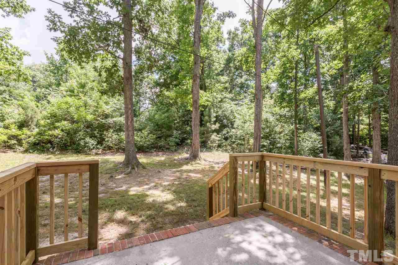 3900 Donna Road Raleigh, NC 27604 - Photo 21 of 25 a view of a wooden fence next to a yard