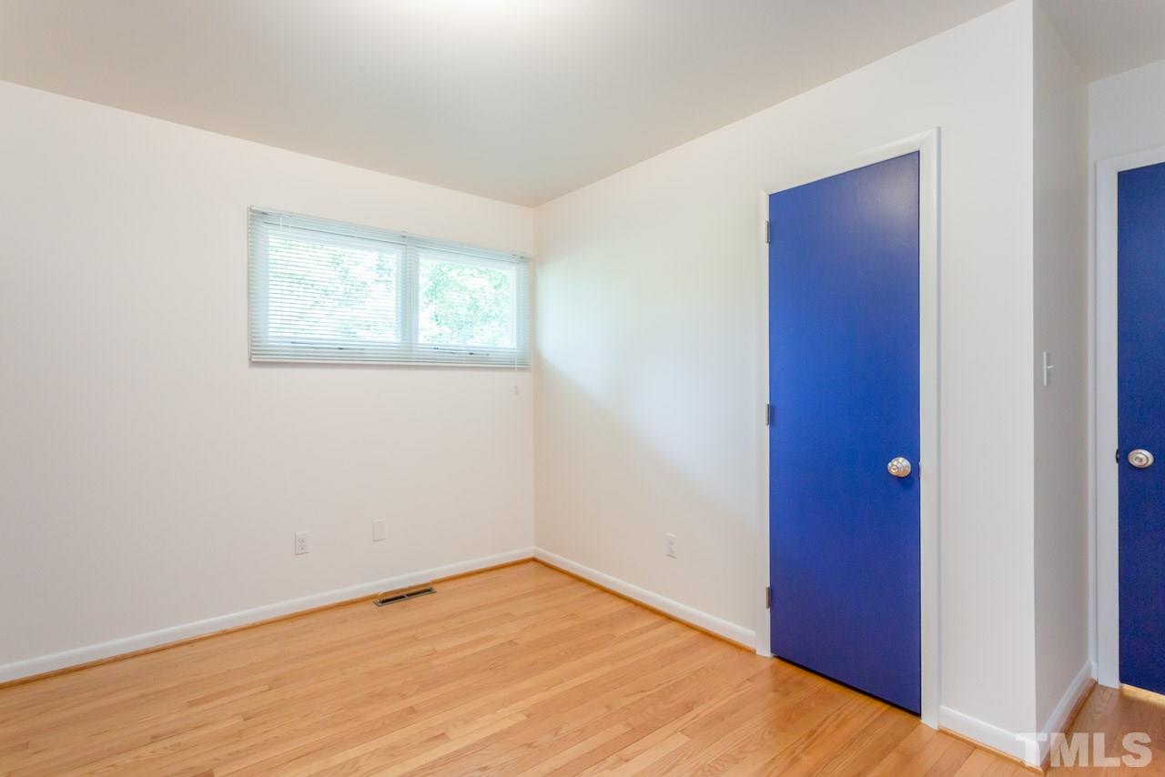 3900 Donna Road Raleigh, NC 27604 - Photo 10 of 25 a view of empty room with wooden floor