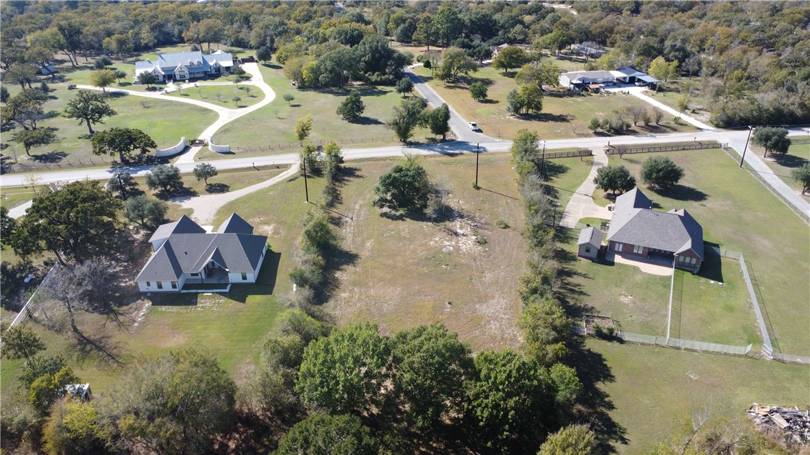 13185 Hopes Creek Road College Station, TX 77845 - Photo 7 of 11 an aerial view of residential houses with outdoor space
