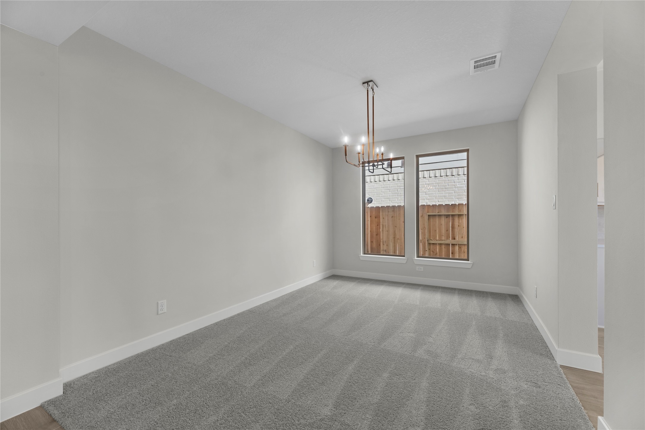 5023 Nesbit Path Rosenberg, TX 77471 - Photo 9 of 25 a view of an empty room with windows