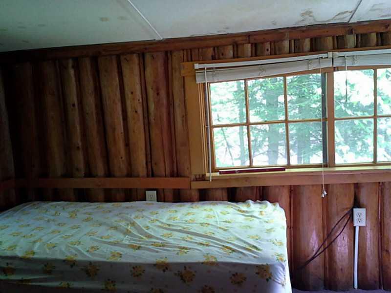 31 Hatchery Road Rangeley, ME 04964 - Photo 22 of 35 Bedroom. second bedroom with window...