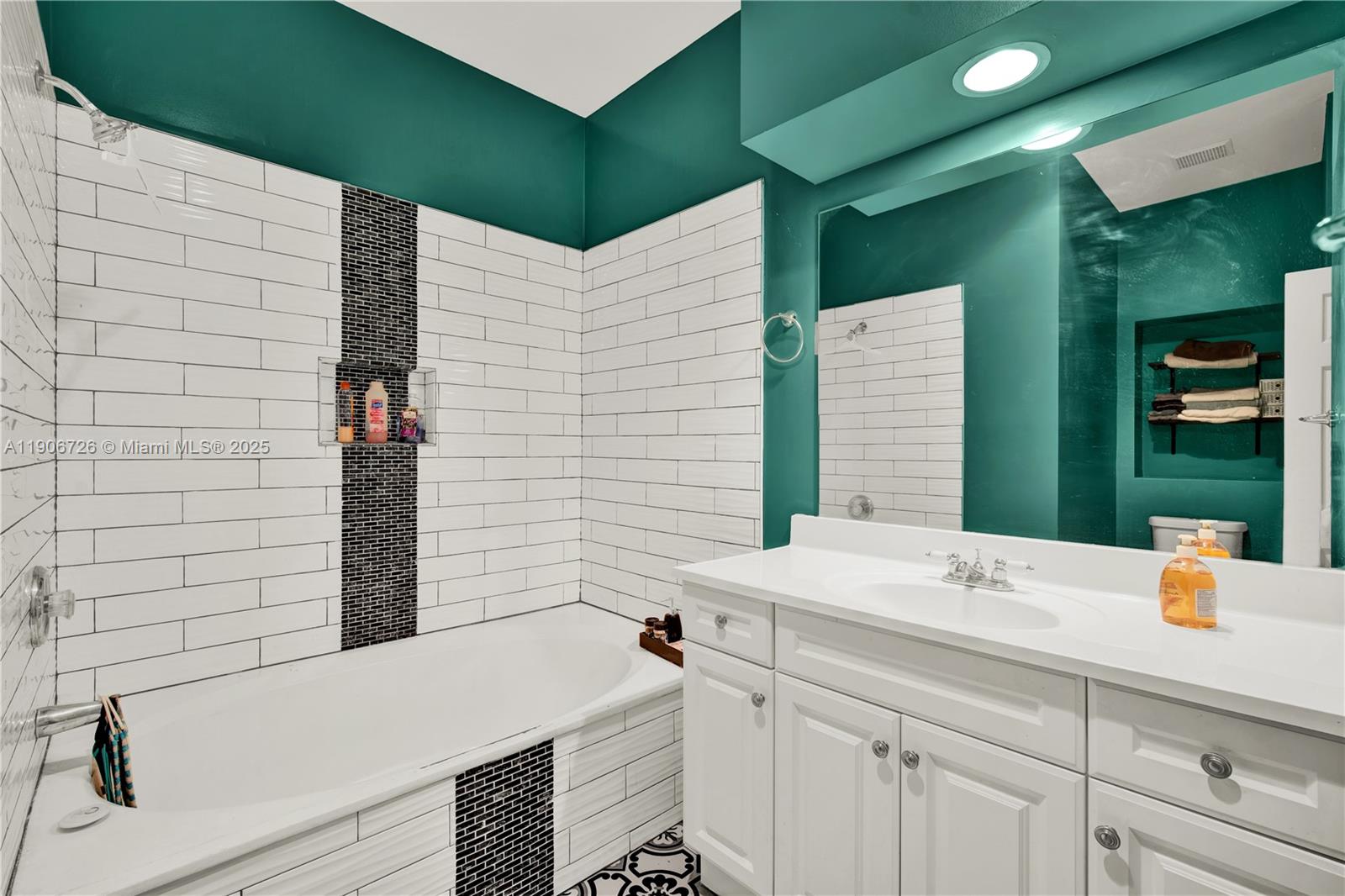 10973 Southwest 238th Street Homestead, FL 33032 - Photo 18 of 25 a bathroom with a sink and a bathtub