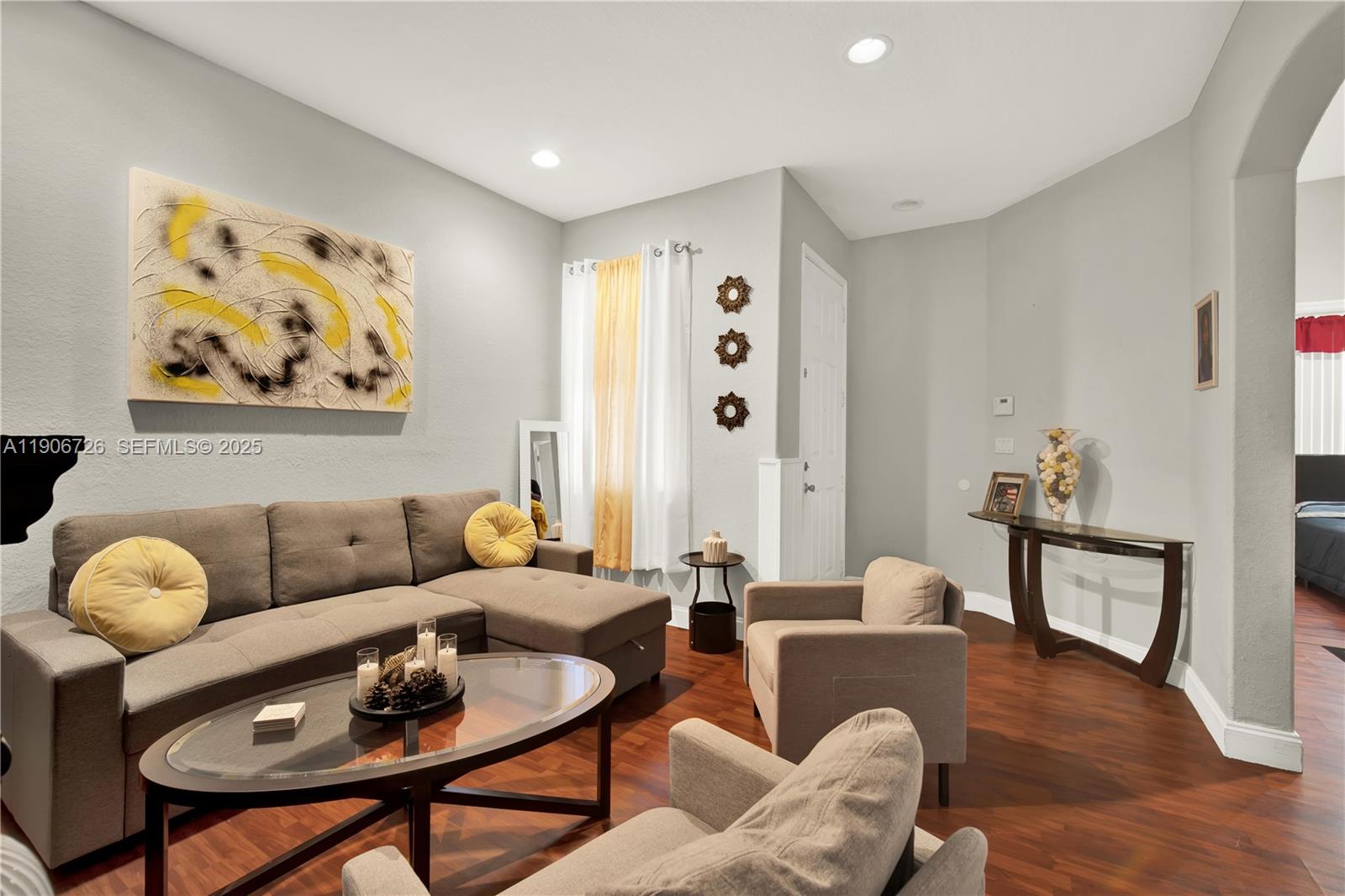 10973 Southwest 238th Street Homestead, FL 33032 - Photo 4 of 25 a living room with furniture and wooden floor