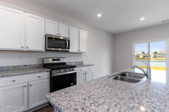 $396,999 | 1129 Sandy Hts Loop, Unit LOT 80, Navassa, NC 28451