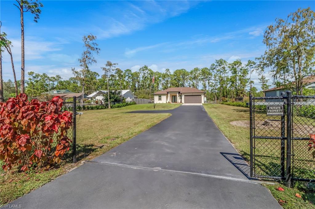 4143 2nd Avenue Northeast Naples, FL 34120 - Photo 13 of 15 a view of a backyard