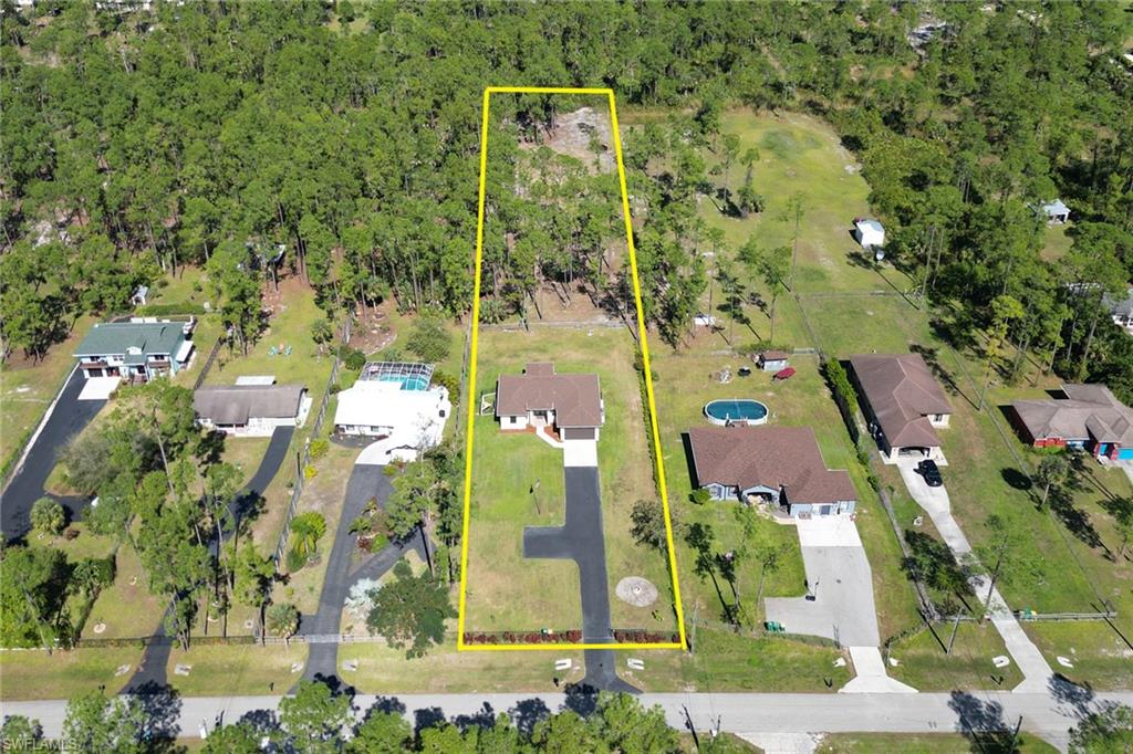 4143 2nd Avenue Northeast Naples, FL 34120 - Photo 15 of 15 an aerial view of waterside residential houses with outdoor space