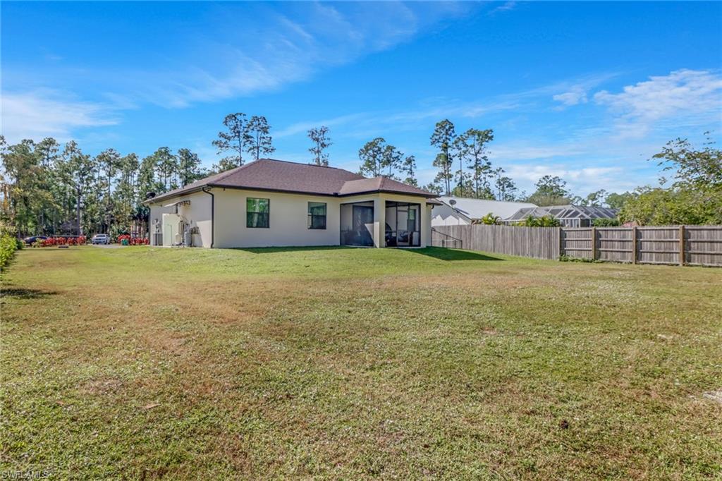4143 2nd Avenue Northeast Naples, FL 34120 - Photo 4 of 15 a view of a house with a outdoor space