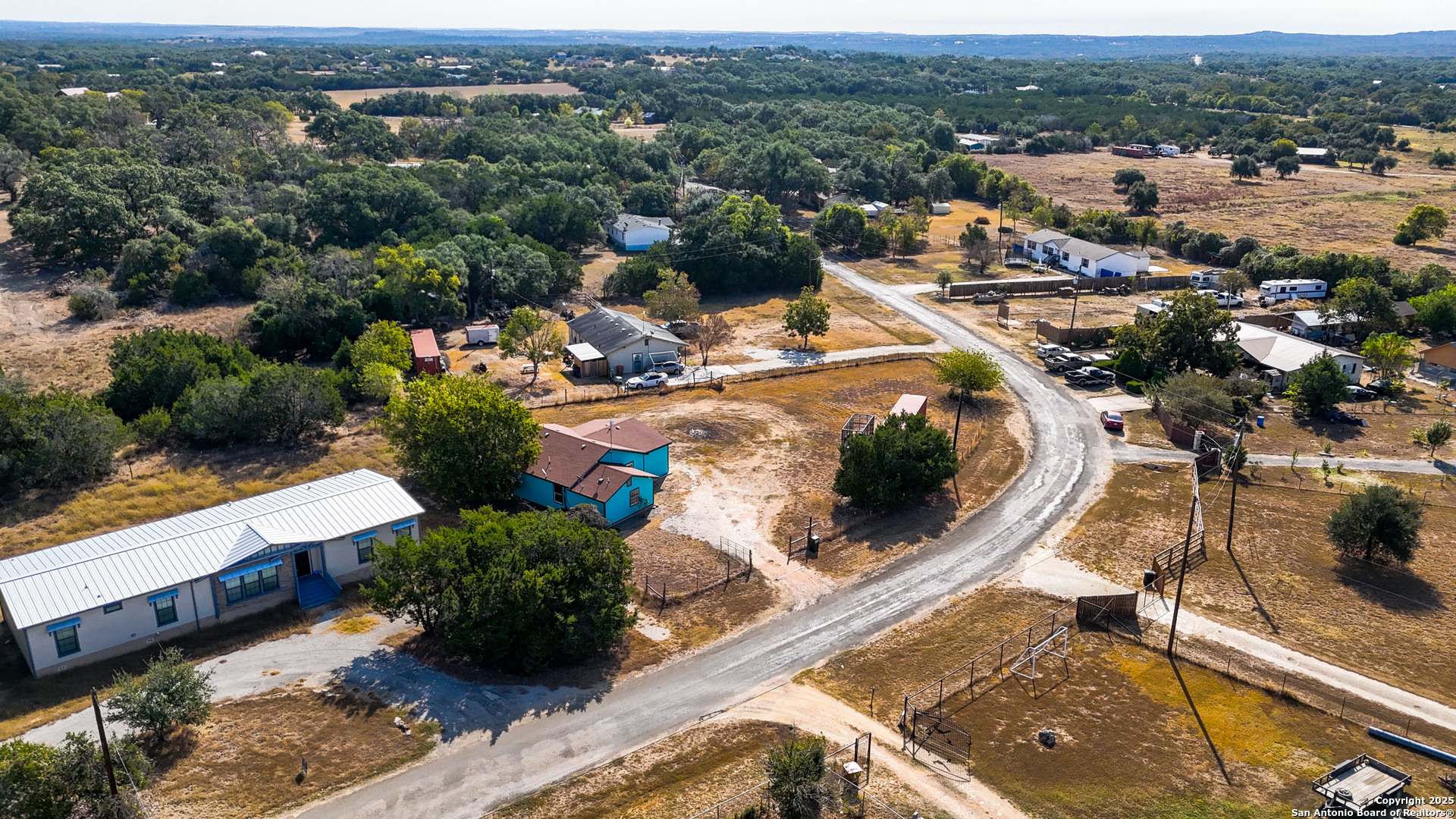 331 Rangeland Road Blanco, TX 78606 - Photo 13 of 49 a view of a lake with a mountain