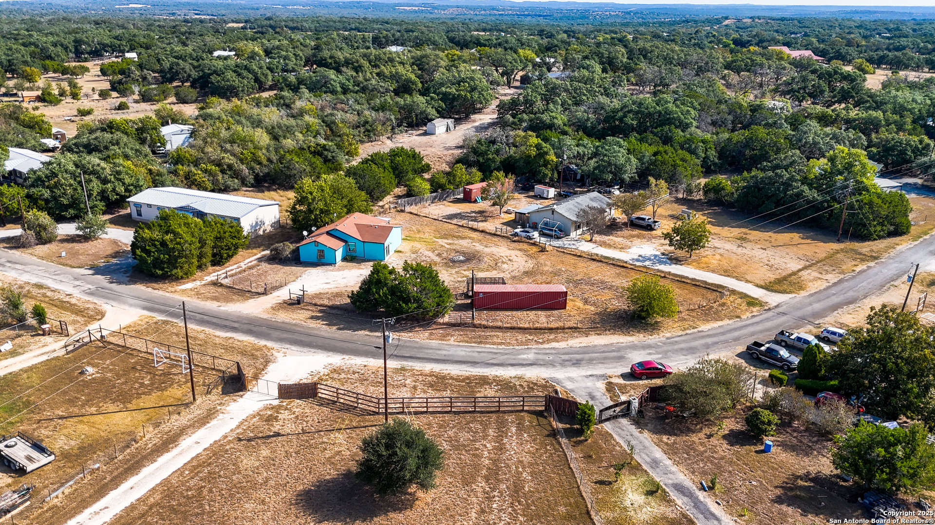 331 Rangeland Road Blanco, TX 78606 - Photo 15 of 49 a view of a swimming pool with a patio