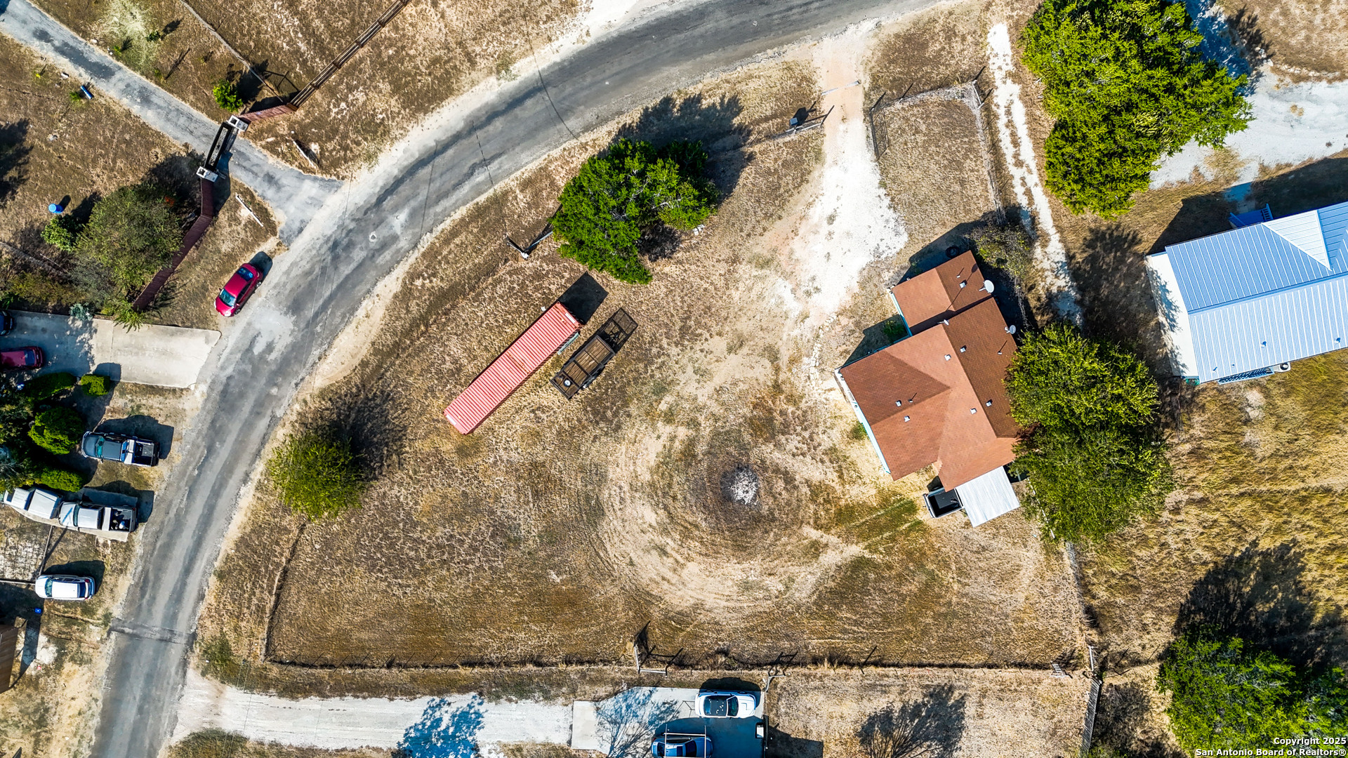 331 Rangeland Road Blanco, TX 78606 - Photo 22 of 49 an aerial view of a house with a yard