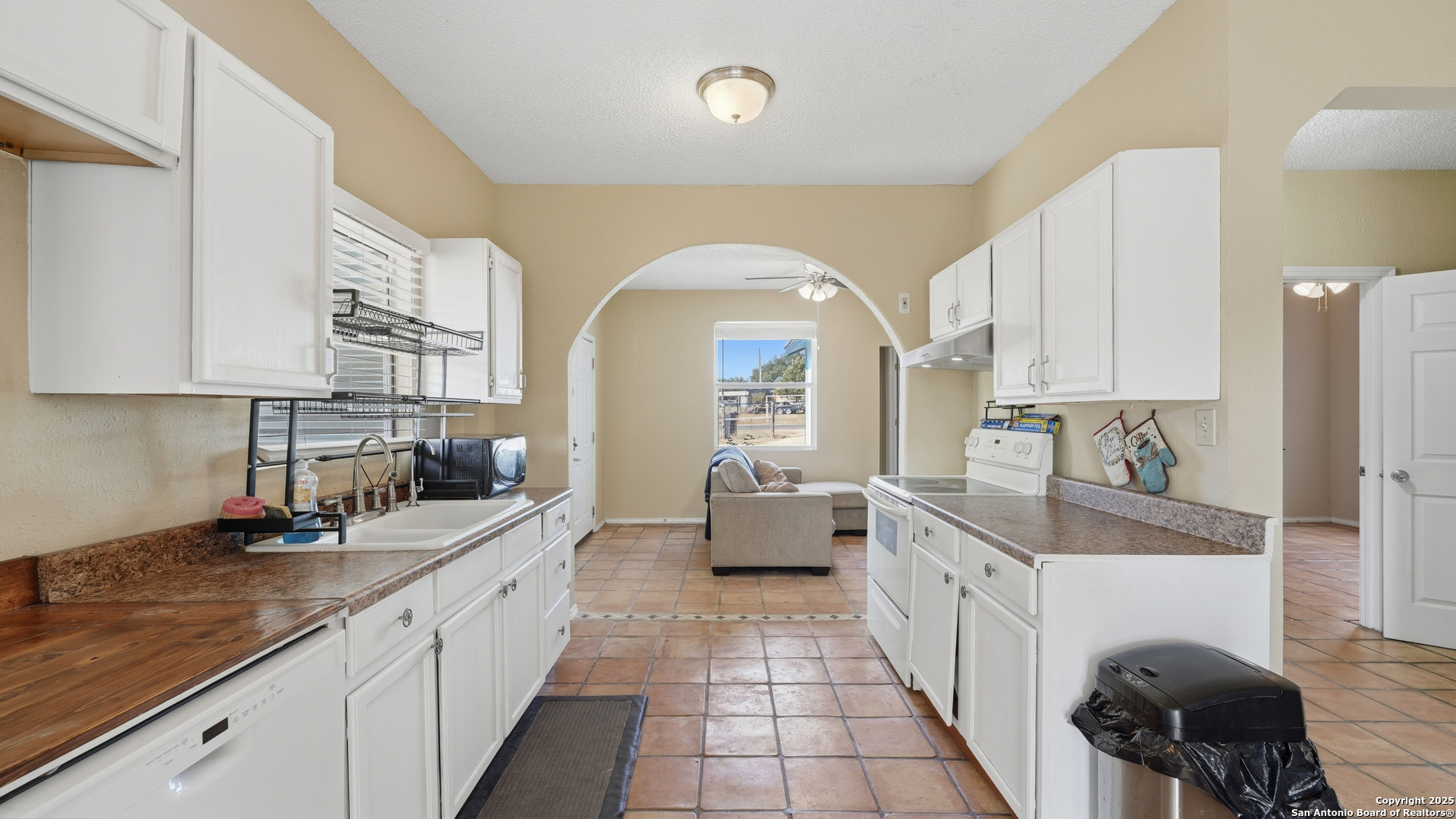 331 Rangeland Road Blanco, TX 78606 - Photo 31 of 49 a large kitchen with stainless steel appliances lots of counter space and a sink