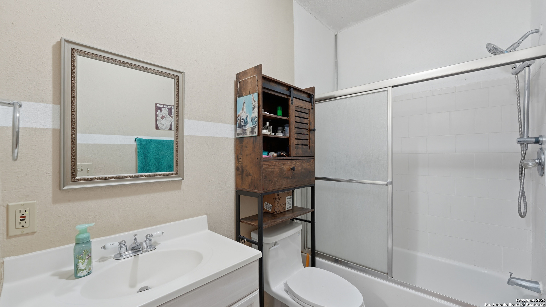 331 Rangeland Road Blanco, TX 78606 - Photo 38 of 49 a bathroom with a sink toilet and shower