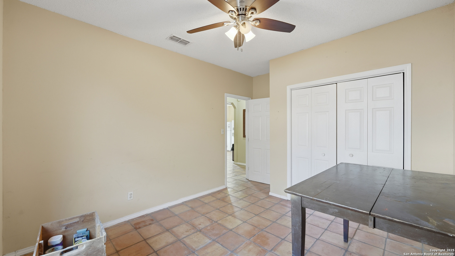331 Rangeland Road Blanco, TX 78606 - Photo 40 of 49 a view of an empty room and chandelier fan
