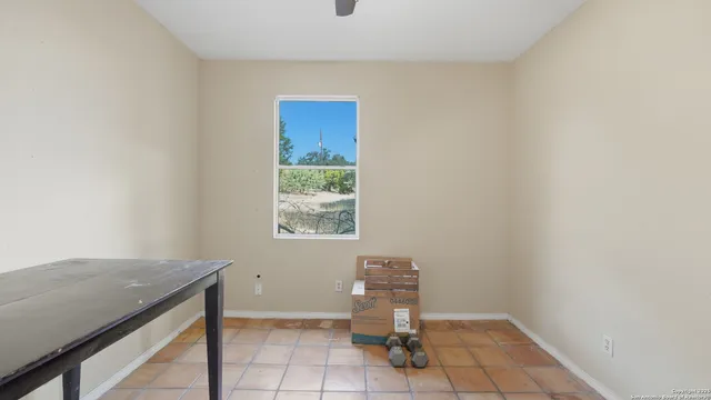 a view of an empty room with window