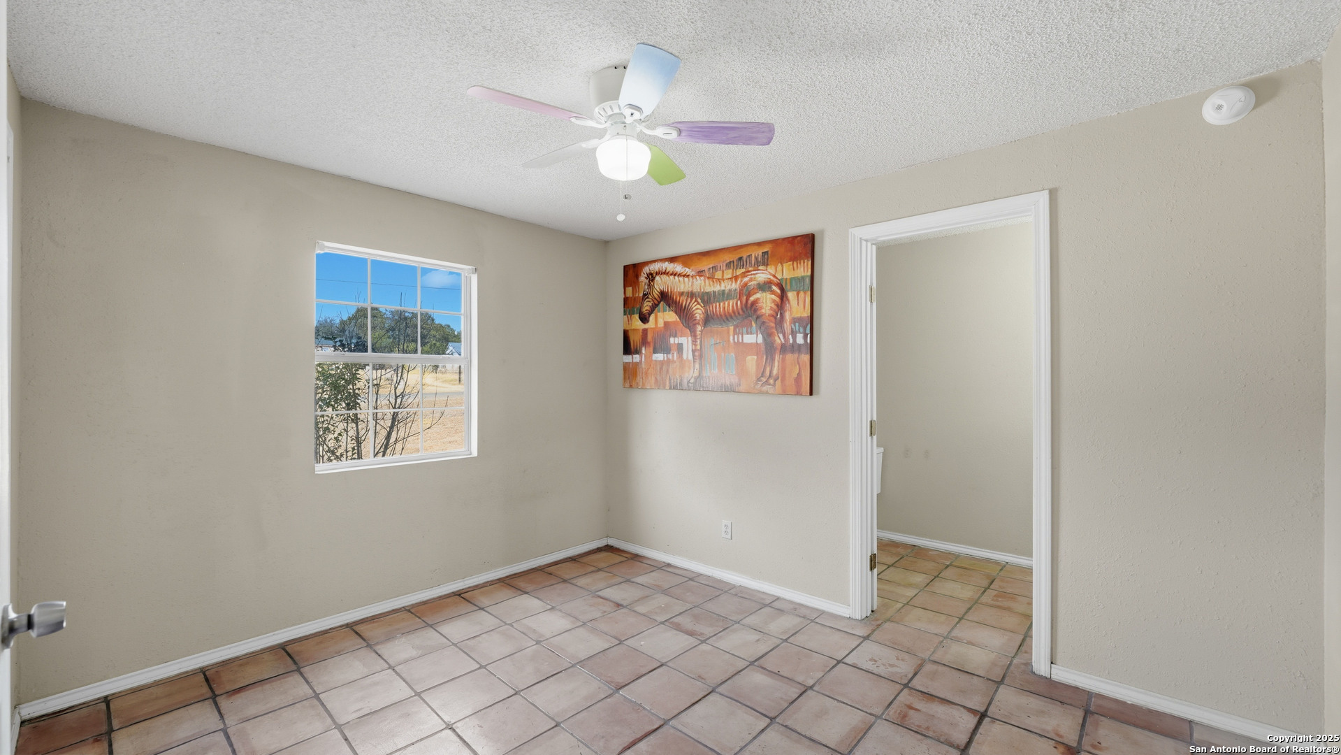 331 Rangeland Road Blanco, TX 78606 - Photo 42 of 49 a view of an empty room with window
