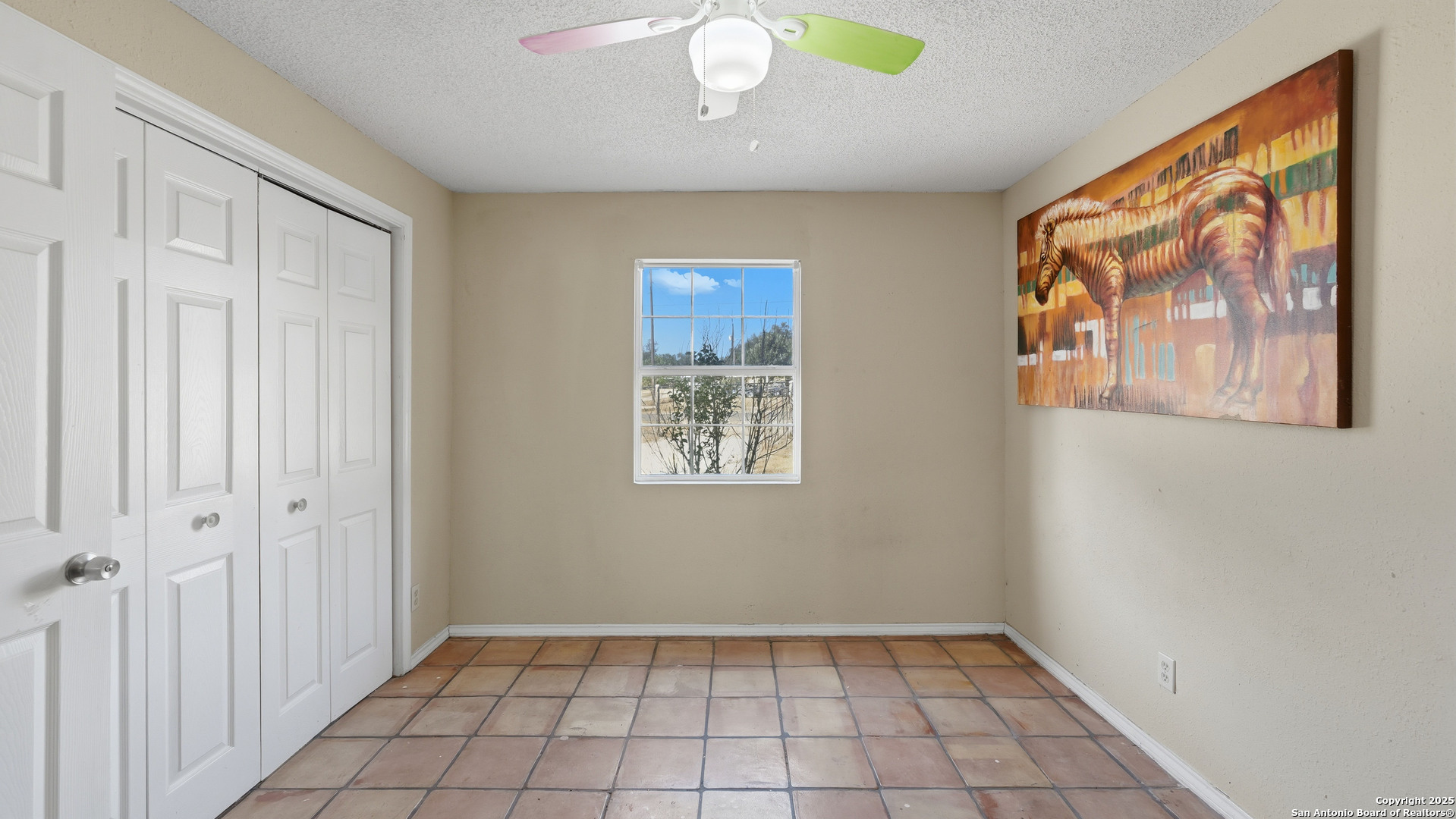 331 Rangeland Road Blanco, TX 78606 - Photo 45 of 49 wooden floor in an empty room with a window