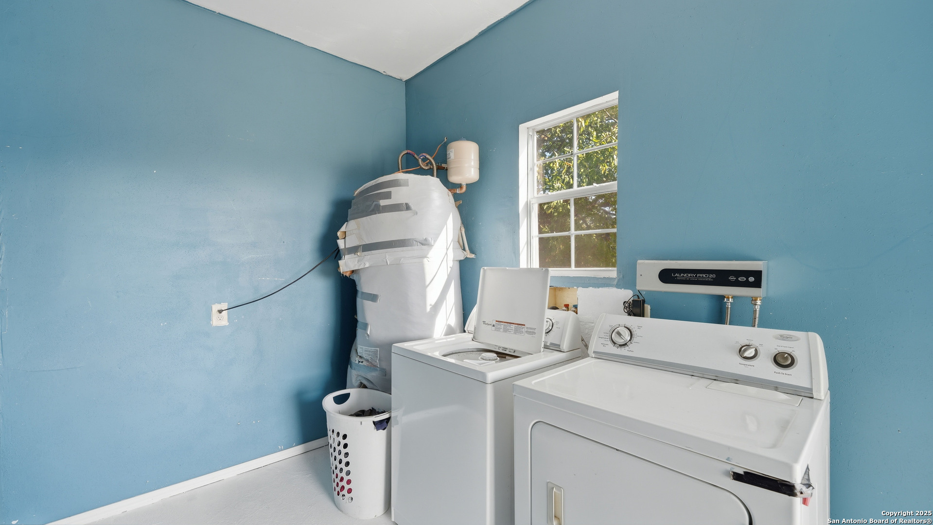 331 Rangeland Road Blanco, TX 78606 - Photo 48 of 49 a room with a washer and dryer