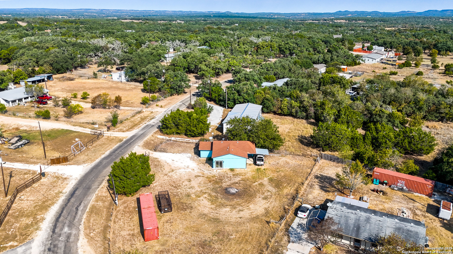 331 Rangeland Road Blanco, TX 78606 - Photo 8 of 49 a view of a city from a terrace