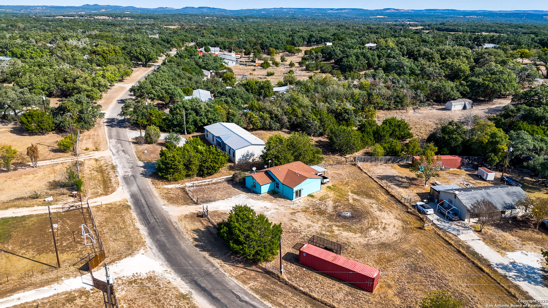 331 Rangeland Road Blanco, TX 78606 - Photo 9 of 49 a view of a city from a terrace