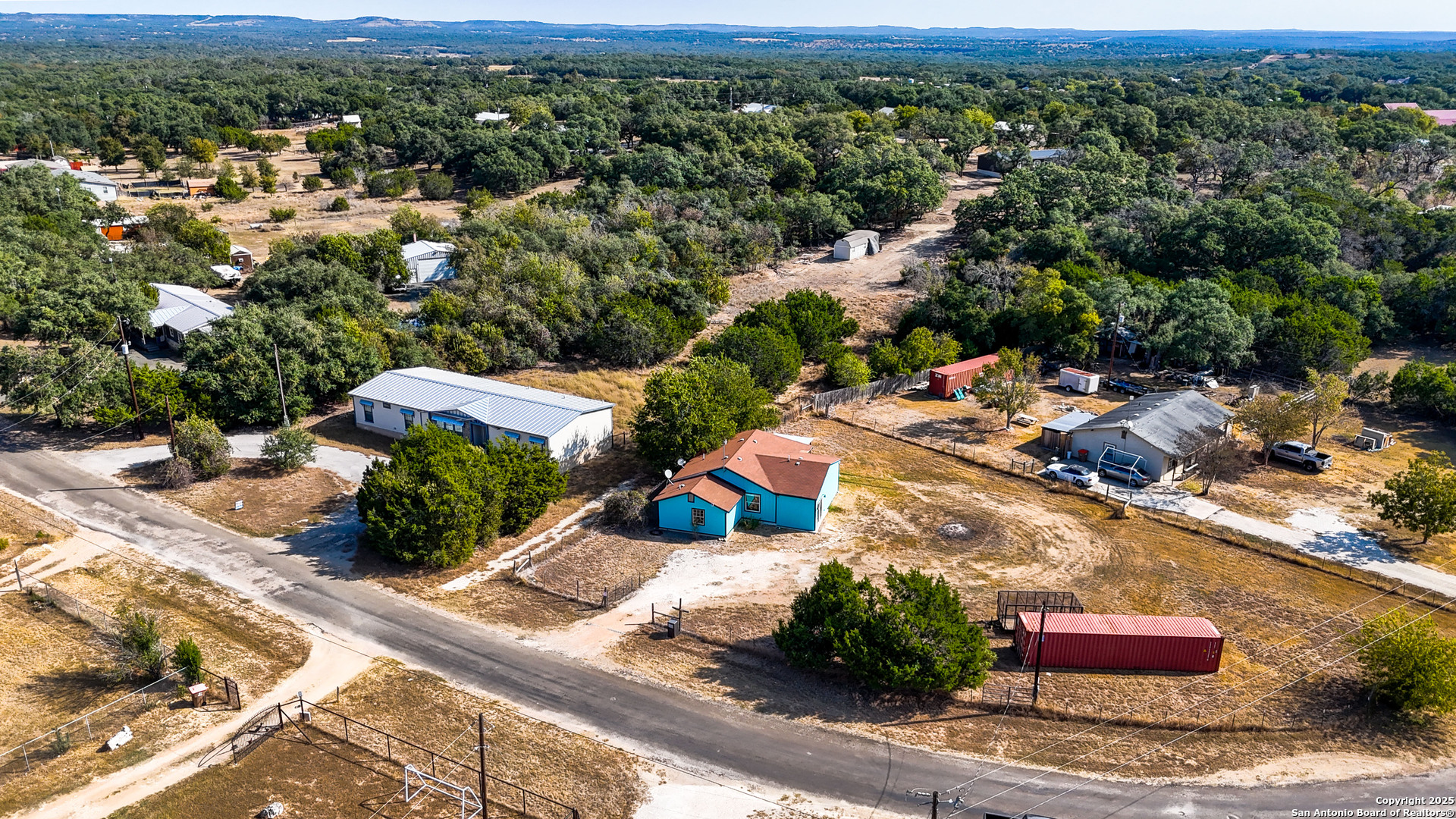 331 Rangeland Road Blanco, TX 78606 - Photo 10 of 49 an aerial view of residential houses with outdoor space