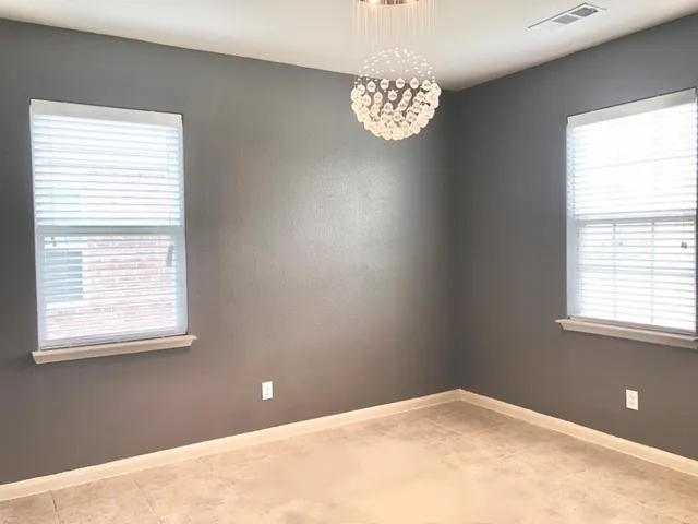 a kitchen with a sink stove and microwave