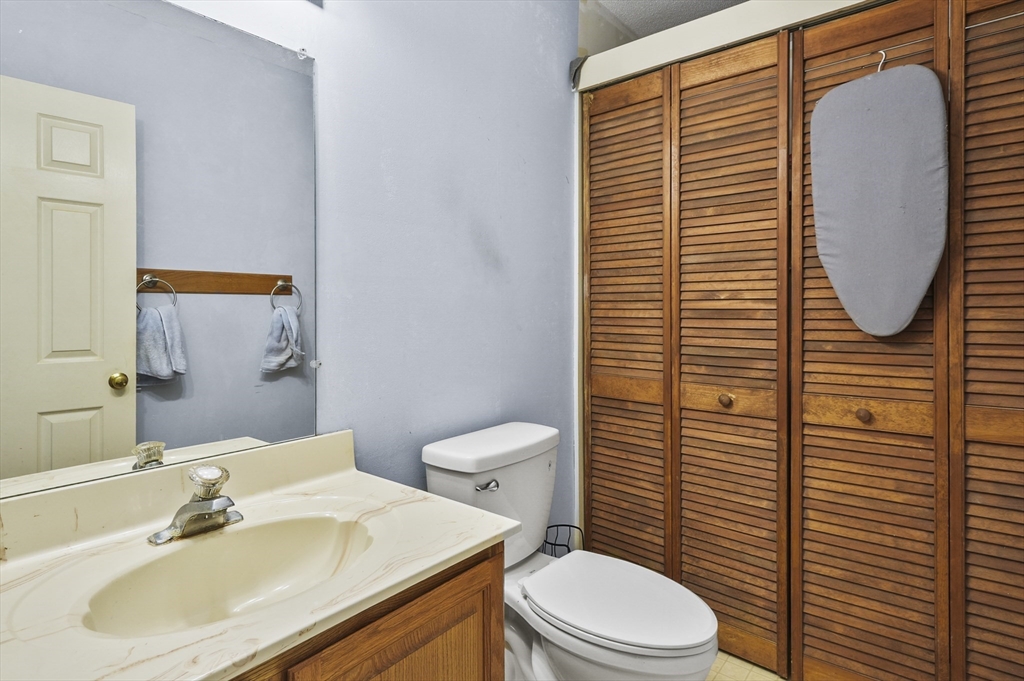 34 Century Way, Unit 34 Gardner, MA 01440 - Photo 12 of 30 a bathroom with a sink a toilet and mirror