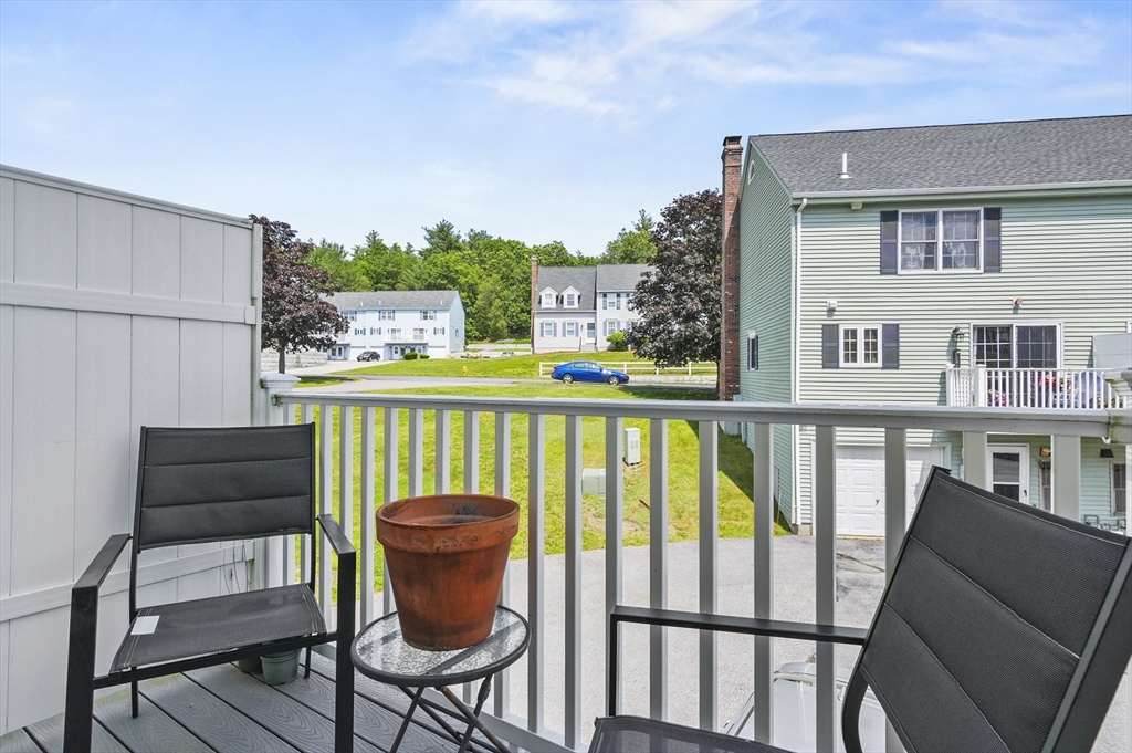 34 Century Way, Unit 34 Gardner, MA 01440 - Photo 24 of 30 a view of a chairs in balcony