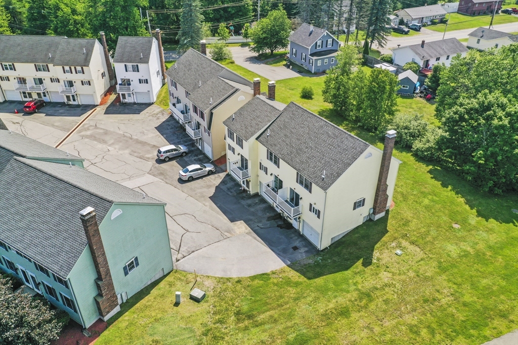 34 Century Way, Unit 34 Gardner, MA 01440 - Photo 26 of 30 an aerial view of a house with garden space and street view
