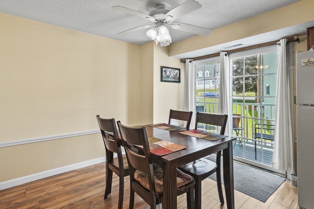 34 Century Way, Unit 34 Gardner, MA 01440 - Photo 6 of 30 a view of a dining room with furniture window and wooden floor