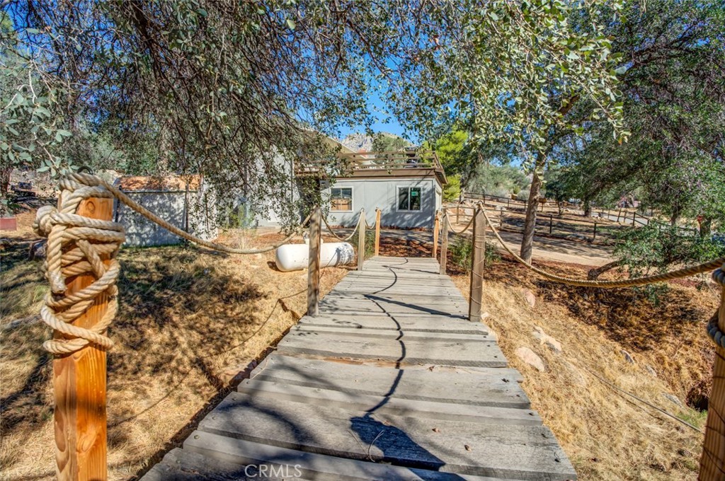 245 Mountain Shadow Road Wofford Heights, CA 93285 - Photo 40 of 72 a view of a backyard with sitting area