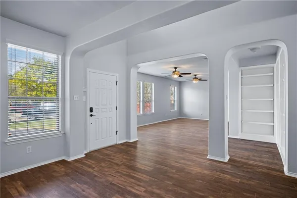 a view of a livingroom with wooden floor