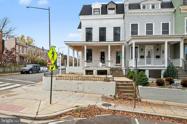 a front view of a building with street view