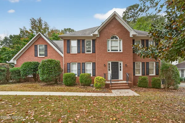 a house view with a garden space