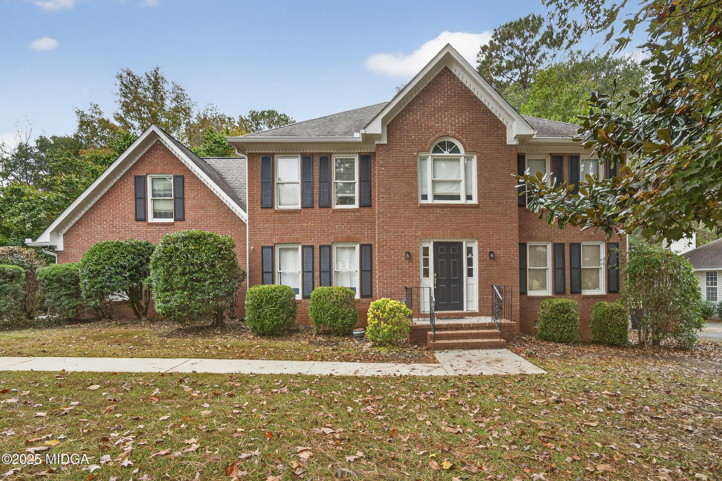 a house view with a garden space