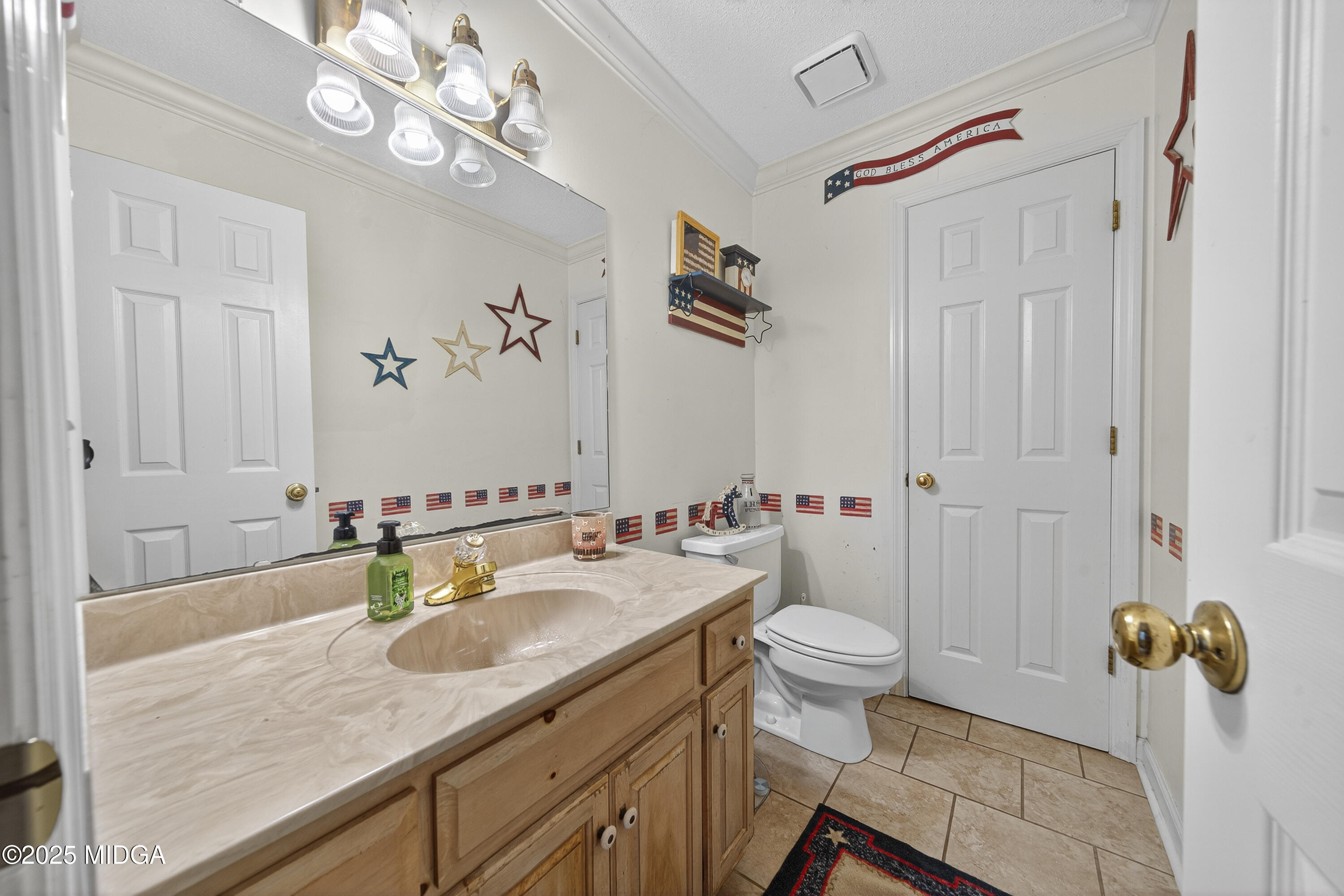 181 Rivoli Landing Macon, GA 31210 - Photo 11 of 37 a bathroom with a granite countertop sink a toilet and shower
