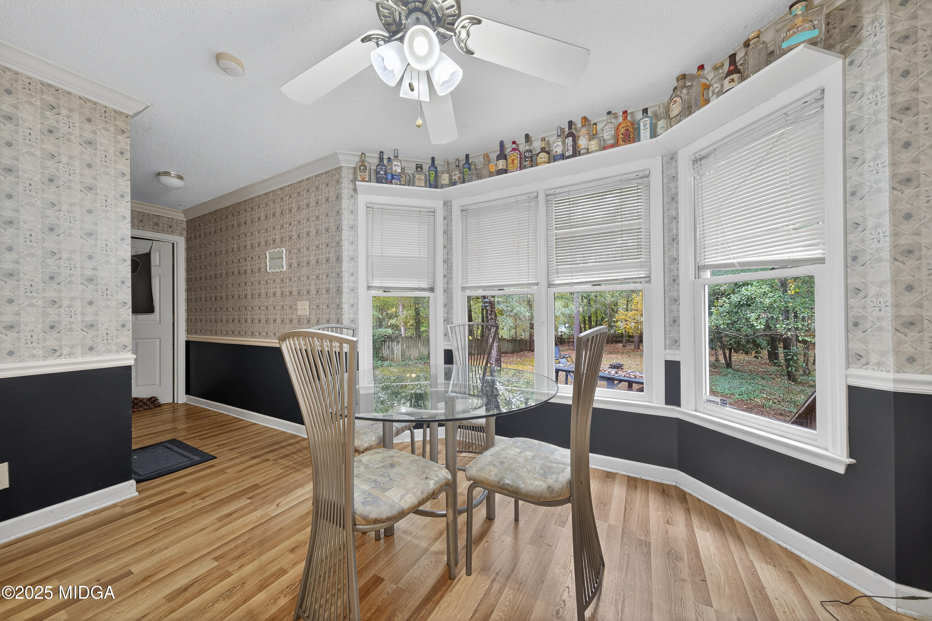 181 Rivoli Landing Macon, GA 31210 - Photo 12 of 37 a view of a dining room with furniture window and wooden floor