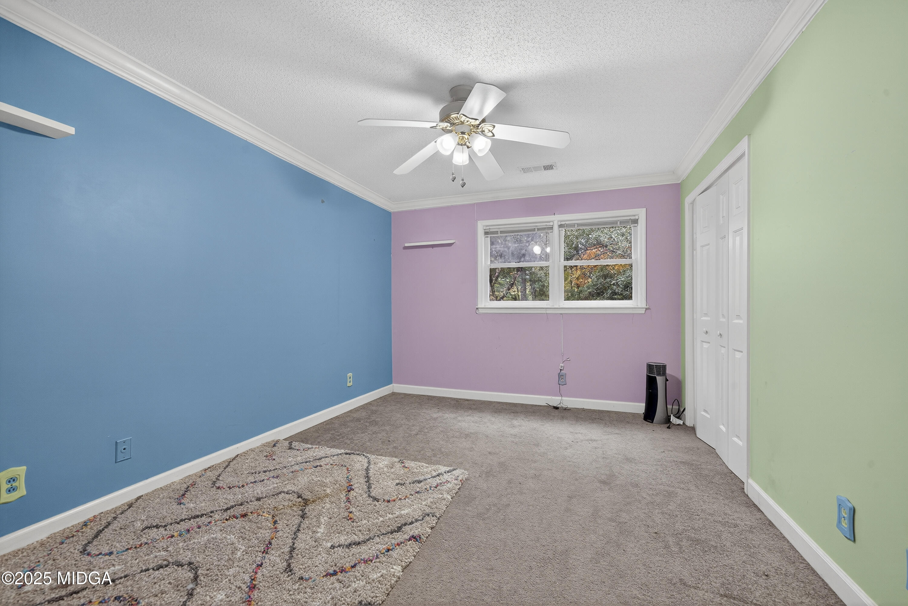 181 Rivoli Landing Macon, GA 31210 - Photo 22 of 37 an empty room with windows and fan