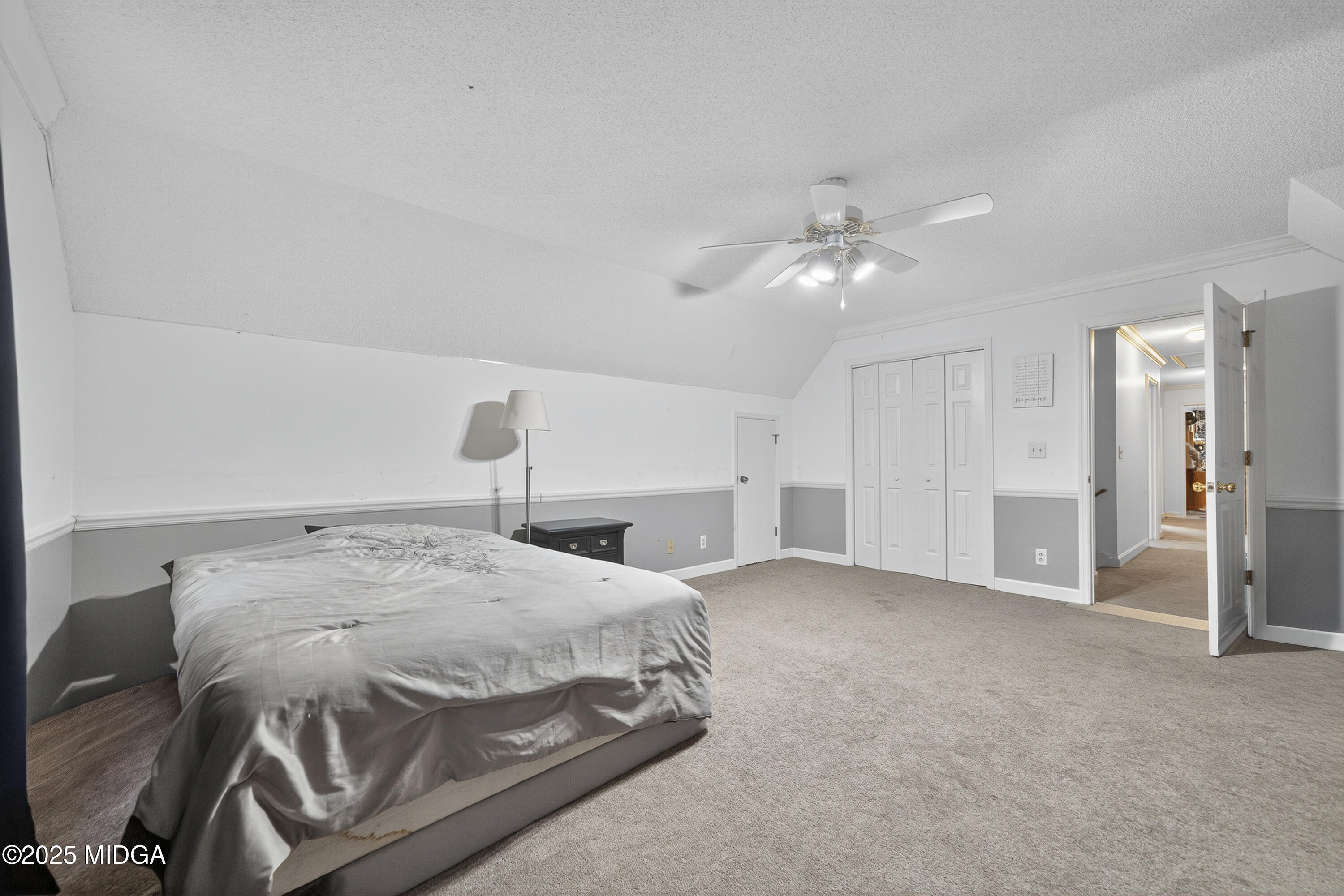 181 Rivoli Landing Macon, GA 31210 - Photo 27 of 37 a bedroom with a bed and a ceiling fan