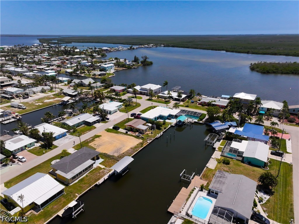 2652 Bridgeview Street Matlacha, FL 33993 - Photo 1 of 11 an aerial view of a houses with ocean view