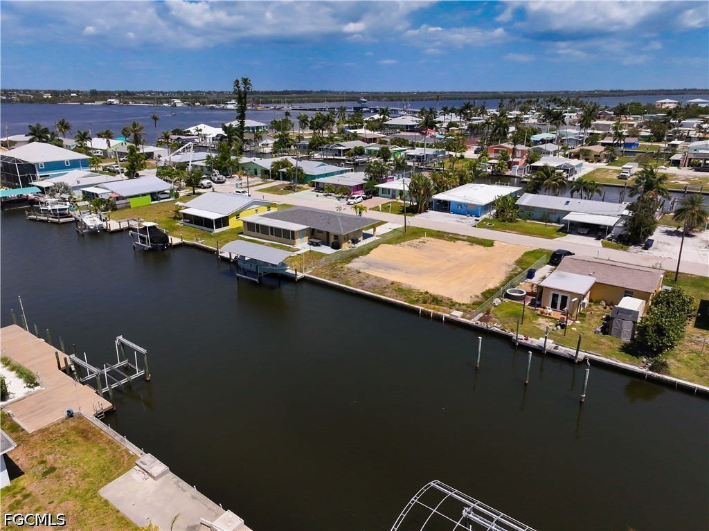2652 Bridgeview Street Matlacha, FL 33993 - Photo 8 of 11 an aerial view of a residential building with outdoor space
