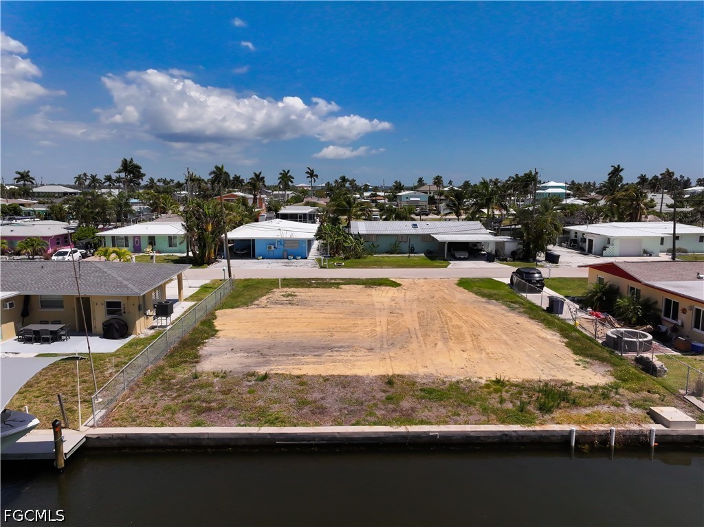 2652 Bridgeview Street Matlacha, FL 33993 - Photo 10 of 11 a view of outdoor space with swimming pool and seating