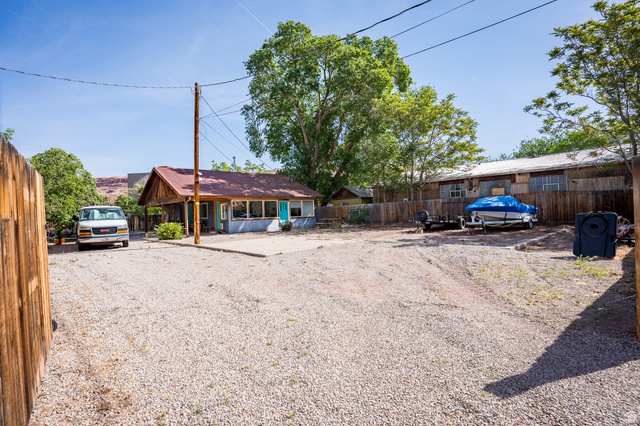 186 West Center Street Moab, UT 84532 - Photo 13 of 15 Gravel driveway providing ample parking and access to the property