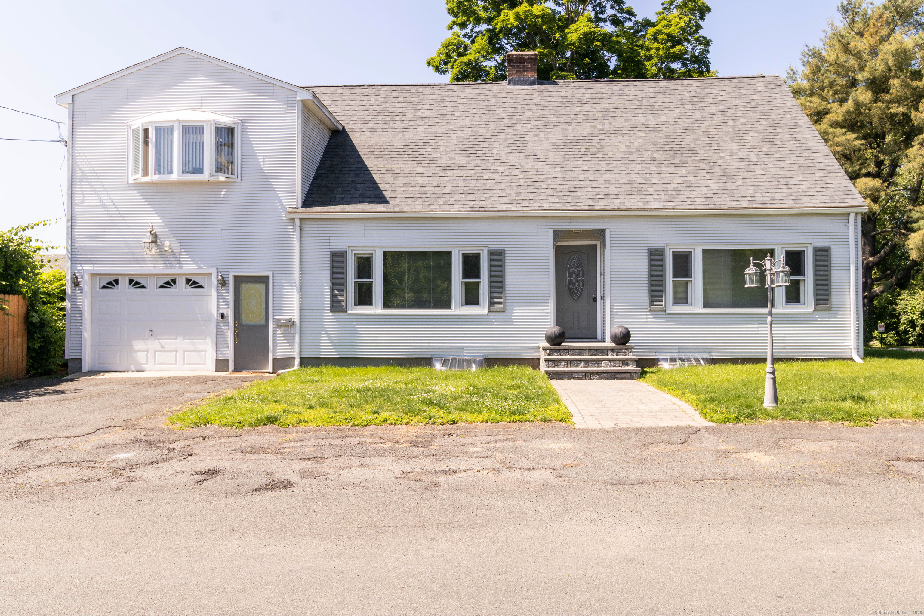 a view of front a house with a swimming pool