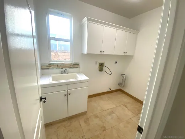 a bathroom with a sink toilet and tub